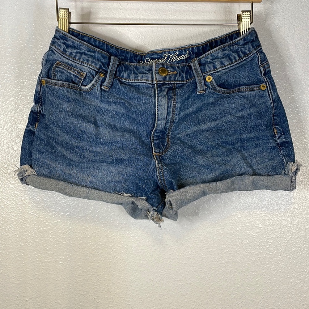 Medium washed shorts.
